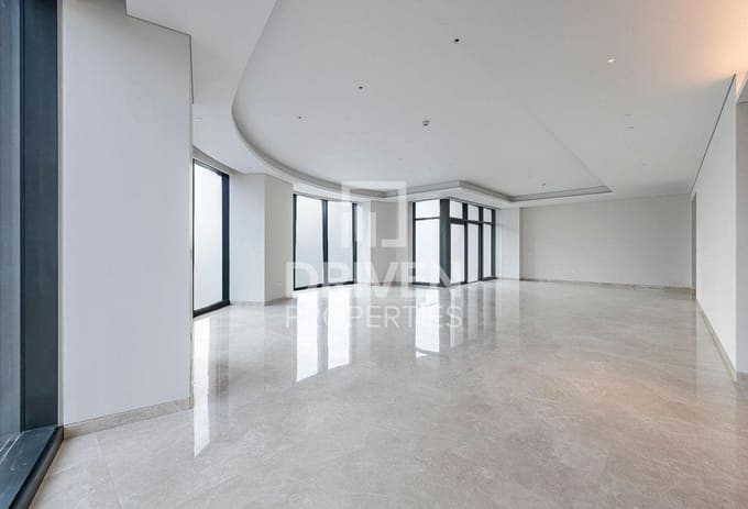 Downtown listing photograph of the spacious unfurnished living room