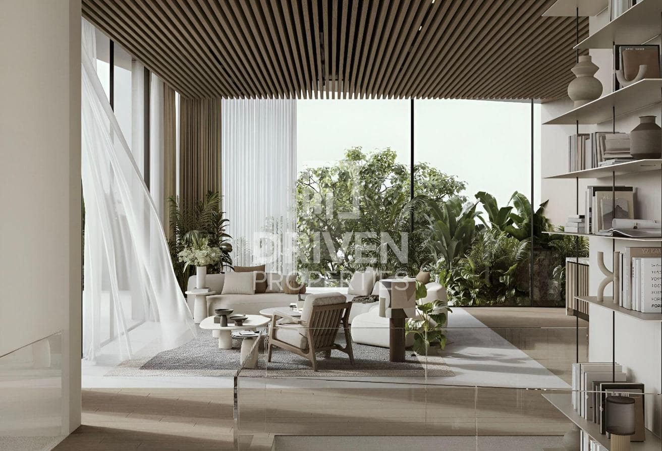 Altissima listing image showing the light-filled lounge and surrounding greenery