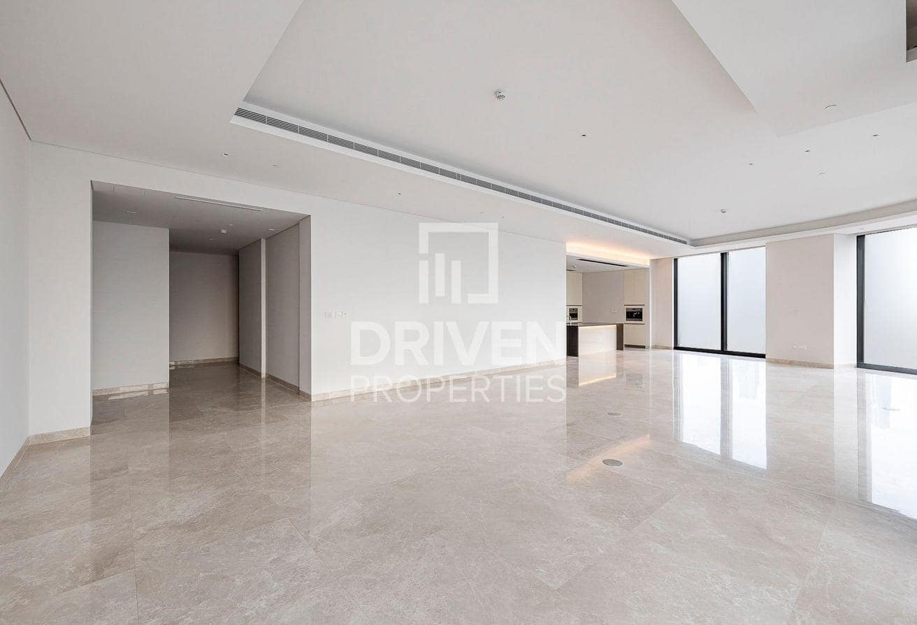 Downtown listing photograph showing an open interior and kitchen
