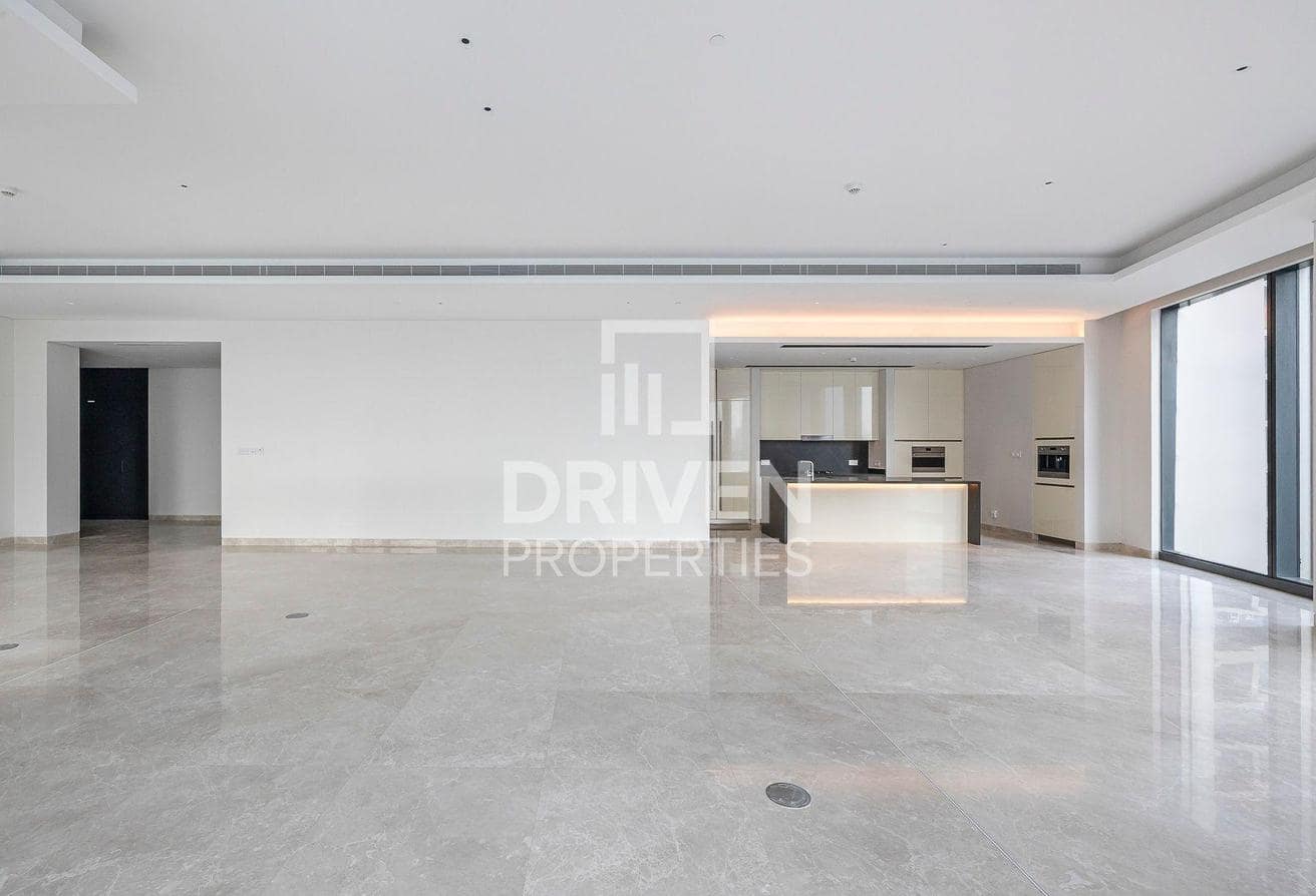 Downtown listing photograph of the open-plan kitchen and living space